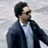 The man believed to be the gunman walking into the building in New York City.