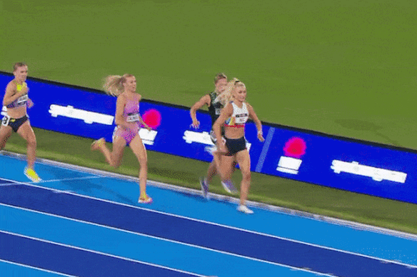 Jess Hull is felled in the final straight of the 1500m final.