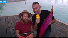 Grant ‘Scooter’ Patterson and Ian Thorpe reveal the first emblem piece.