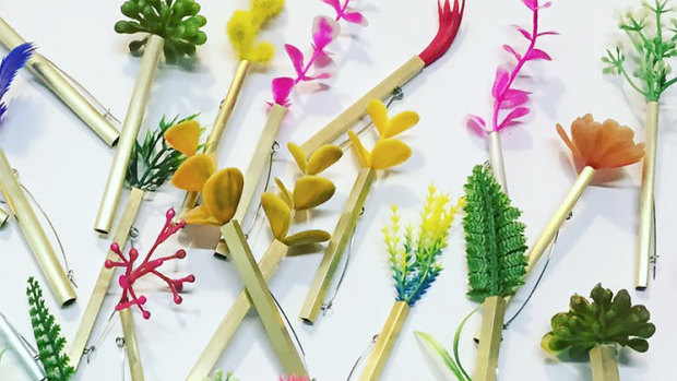 Weed pins by artists Lauren Simeoni and Melinda Young.