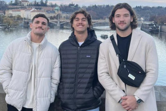 Chanel Harris-Tavita (centre) with Nathan Cleary and Pat Carrigan in Prague after the 2022 World Cup.