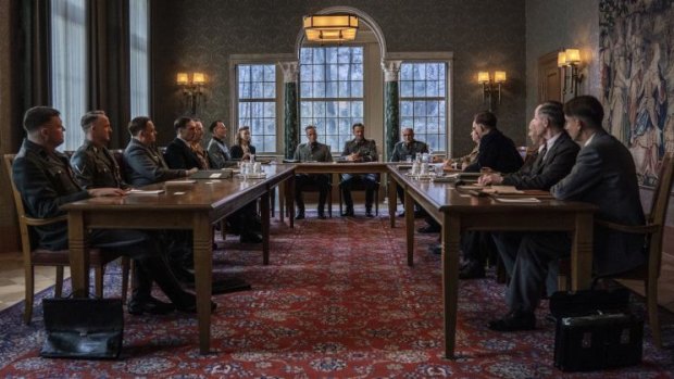 Gathered around a table, these men casually plan 11 million murders