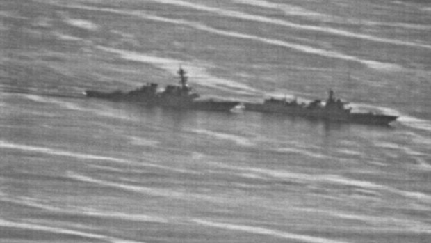 US Navy photo showing a confrontation between the USS Decatur (left) and PRC Warship 170 (right) in the South China Sea on Sunday.