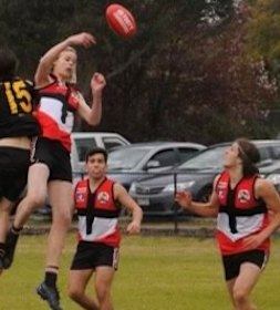 Tom De Koning at Mt Martha, hitting the ball to Hunter Clark, now at St Kilda.