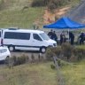 Police divers arrive at the scene.
Police have blocked off Hazelton Road, Bungonia, to everyone but residents as they search for the bodies of  the two missing men.