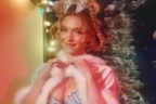 Sydney Sweeney dressed as Cindy Lou Who in a new holiday campaign for her lingerie brand Syrn.