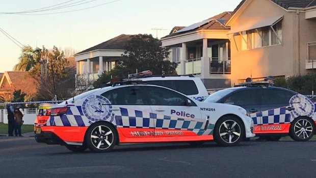 Police at a Newcastle house after the body of an elderly woman was found.