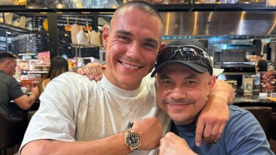 Tim and Kostya Tszyu share a moment after training.