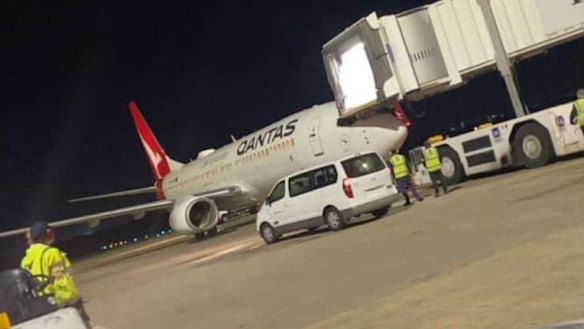 The Qantas aircraft windscreen was broken after the plane made contact with the passenger jet bridge at Brisbane Airport.