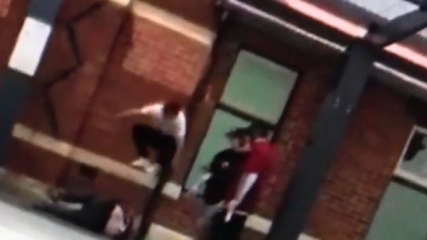 One teenager is accused of jumping in the air and landing on the head of one of the victims.