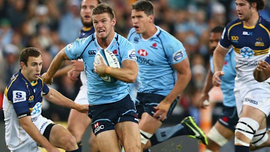 Hard man: Rob Horne in action for the NSW Waratahs before a career-ending injury. 