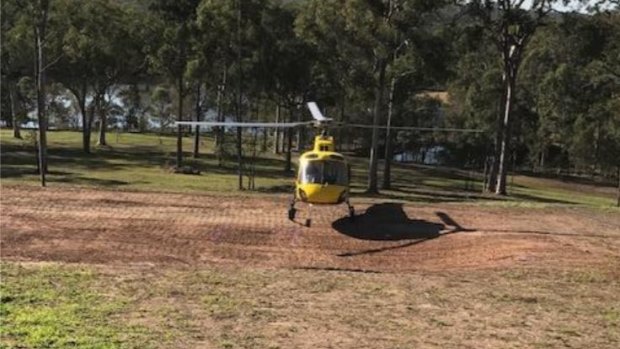 A helicopter landing at the Rochedale property during a testing day.