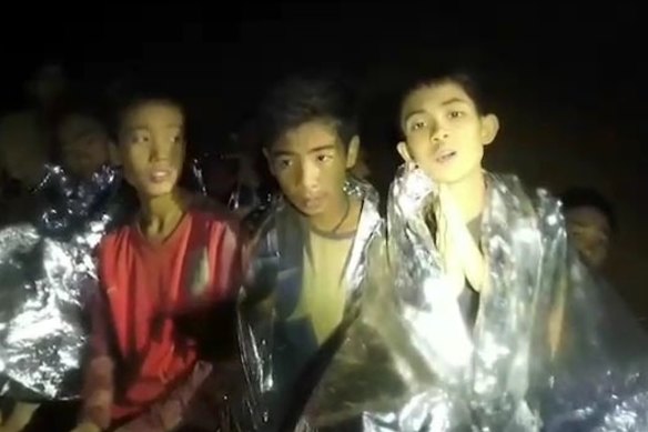 The team’s coach taught the boys in the cave how to meditate so they could conserve energy. This image is taken from a Thai Navy SEAL video.