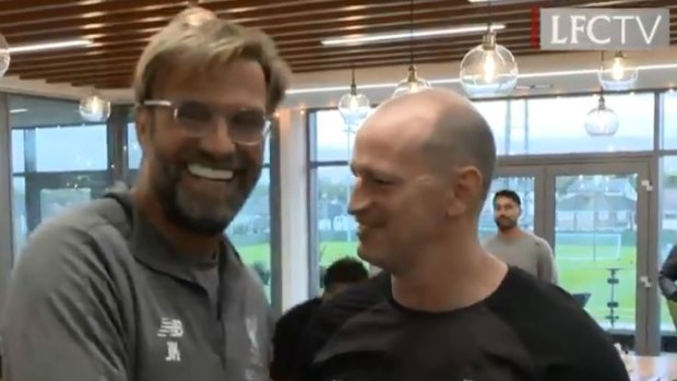Hello, coach: Liverpool manager Jurgen Klopp meets Michael Maguire.