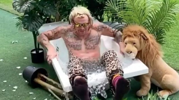 It was an ice bath for Brisbane's Mitch Robinson, dressed as Joe Exotic, but his lion stayed dry.