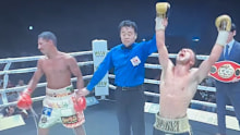 Andrew Moloney celebrates his victory.