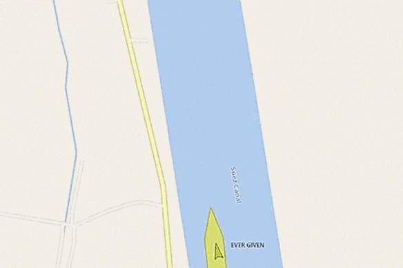 Above: An animation shows tugboats trying to manoeuvre the ship out of the canal wall.