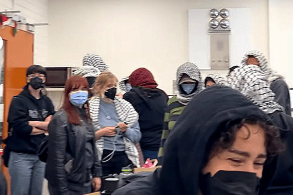 Pro-Palestine protesters occupy Professor Steven Prawer’s office at the University of Melbourne on Wednesday.