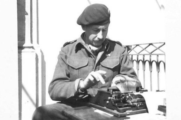 Filing from the front: Roderick Macdonald, 31, wearing the beret awarded to him by British airborne troops.