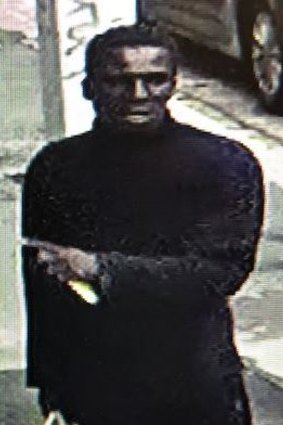 One of the men police wish to speak to following aggravated burglaries in a Spencer Street apartment complex.