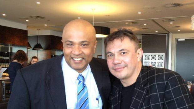 Gerard Vamadevan, left, is accused of posing as a TV executive. Pictured here with former boxer Kostya Tszyu. 