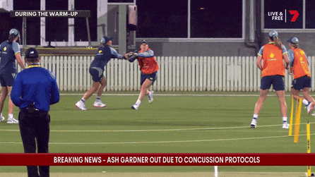 Cricketers Ash Gardner and Georgia Wareham collide in pre-match warm ups.