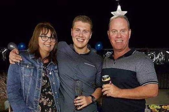 Senior Constable David Masters with wife Sharon and son Jack.