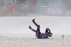 Jack Miller tumbles through the gravel at the MotoGP.