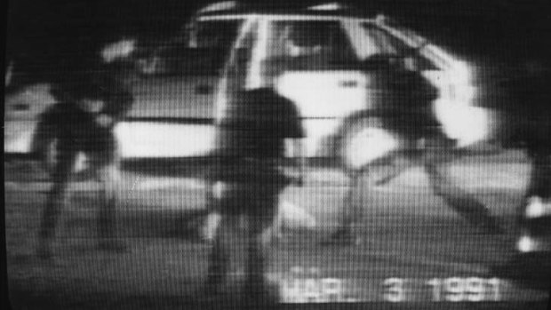 A video clip of Los Angeles police beating Rodney King in 1991.