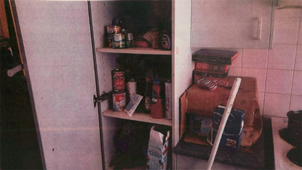 There was rotting food in the kitchen drawers, police said.