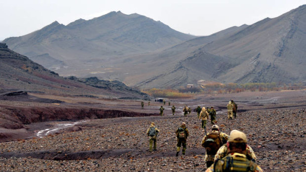 Members of Australia's Special Operations Command move through the Garmab Valley, in Oruzgan Province.