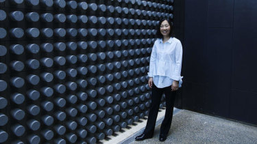 Yueji Lyon by the bolt-studded wall of the new galleries. She put in most of the 1.4kg cylinders herself. 