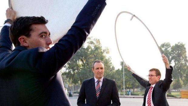 Channel Ten's David Woiwod, Seven's Brendan Donohoe (centre) and Nine's Andrew Lund share resources in Delhi in 2012.