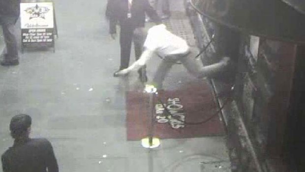 An image from CCTV footage shows an incident outside Showgirls Bar 20 in 2008.