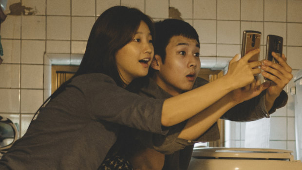 Searching for free Wi-Fi ...  Park So-Dam and Choi Woo-shik in Parasite. 