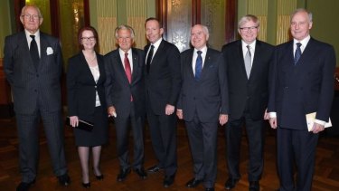 Over in a minute: then prime minister Tony Abbott (centre) with former Australian prime ministers Malcolm Fraser, Julia Gillard, Bob Hawke, John Howard, Kevin Rudd and Paul Keating, at the completion of the Gough Whitlam memorial service in Sydney in 2014.