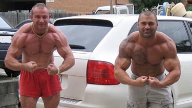 Convicted cocaine trafficker, dock worker and professional bodybuilder Adam Powell, left, with Hakan Ayik.