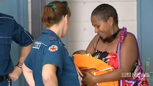 Raina Thaiday thanks paramedics for safely delivering her child in the back of an ambulance in 2009.