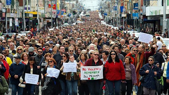 Tens of thousands of people walk along Sydney Road, Melbourne in a "Peace March" after the murder of Jill Meagher in 2012.