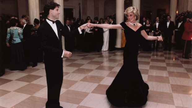 Actor John Travolta dances with the Diana, Princess of Wales at a White House dinner in Washington in 1985.