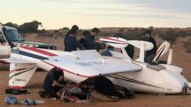 Two West Australians have been dragged from a light aircraft that crashed as it landed at William Creek.