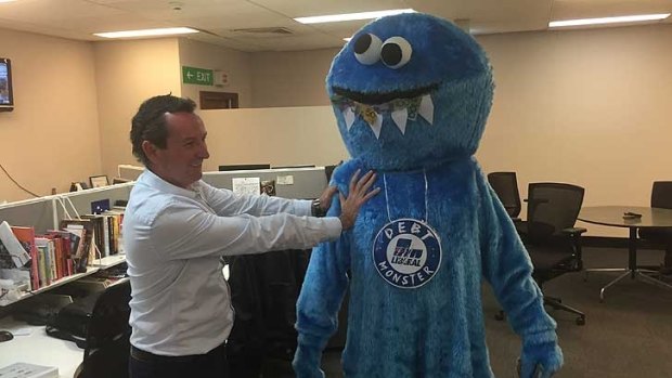 Mark McGowan with Labor's Debt Monster, used to promote its campaign against the Liberal's public debt in 2015.