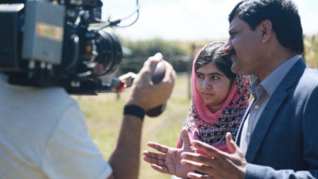 Malala Yousafzai and her father, Ziauddin Yousafzai, in the documentary, <i>He Named Me Malala</i>.