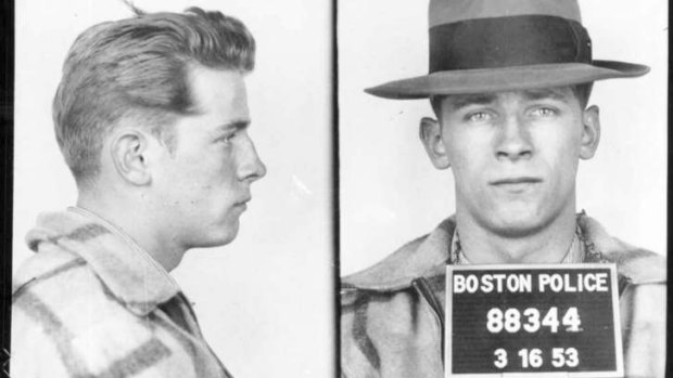 This 1953 Boston police booking file photo combo shows James "Whitey" Bulger after an arrest.