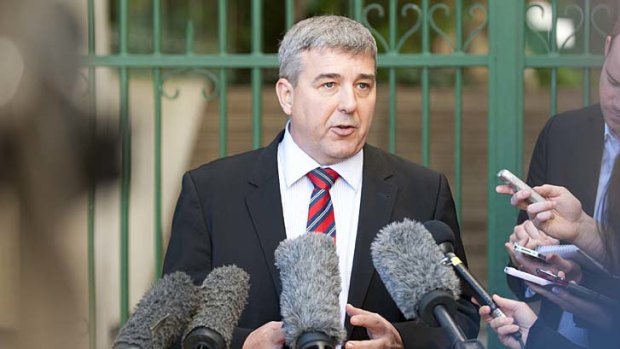 Paul Turner from the RACQ responds to the 2013-14 Queensland budget outside Parliament House.