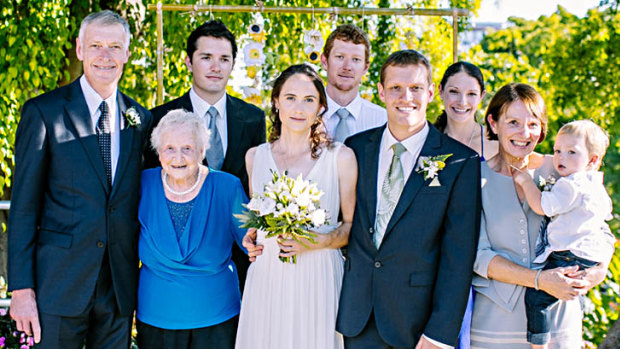 One family's tragedy ...  Paul Guard and wife Jessie Wells, centre, with Paul's parents, MH17  victims Roger and Jill Guard, flanking this family portrait. Also photographed are Jill's mother, Joan  Craik, Paul's brother David and sister Amanda and her husband Bevan Koopman, and, in Jill's arms, grandson Kai Koopman.