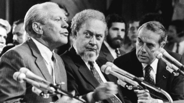 Former US president Gerald Ford, left, introduces Supreme Court nominee Robert Bork, centre, in 1987.