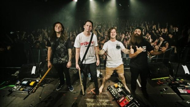 Brisbane band Violent Soho performs to a lively audience enjoying the city's vibrant night life.