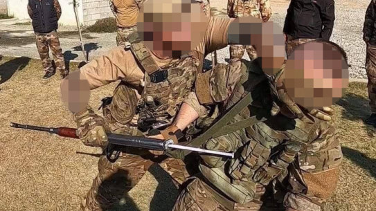 Police have arrested a man in connection to the public assassination of former Rebels bikie boss Nick Martin.