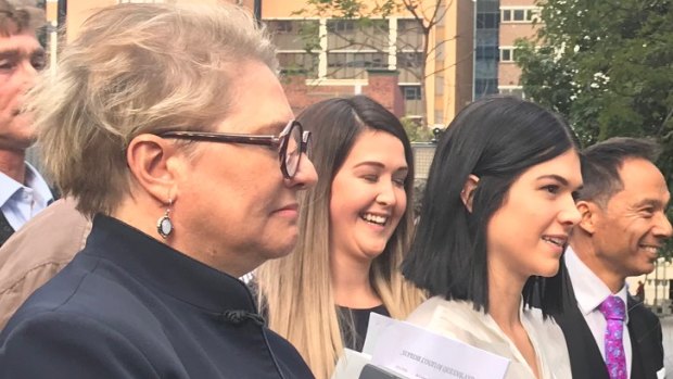 Ayla Cresswell (centre) outside the Brisbane Supreme Court following the verdict.